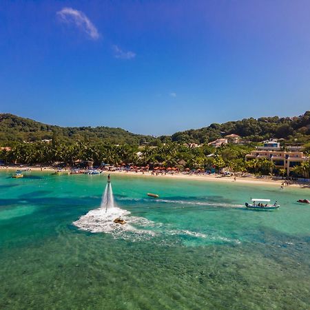 Paradise Beach Hotel & Resort West Bay Buitenkant foto