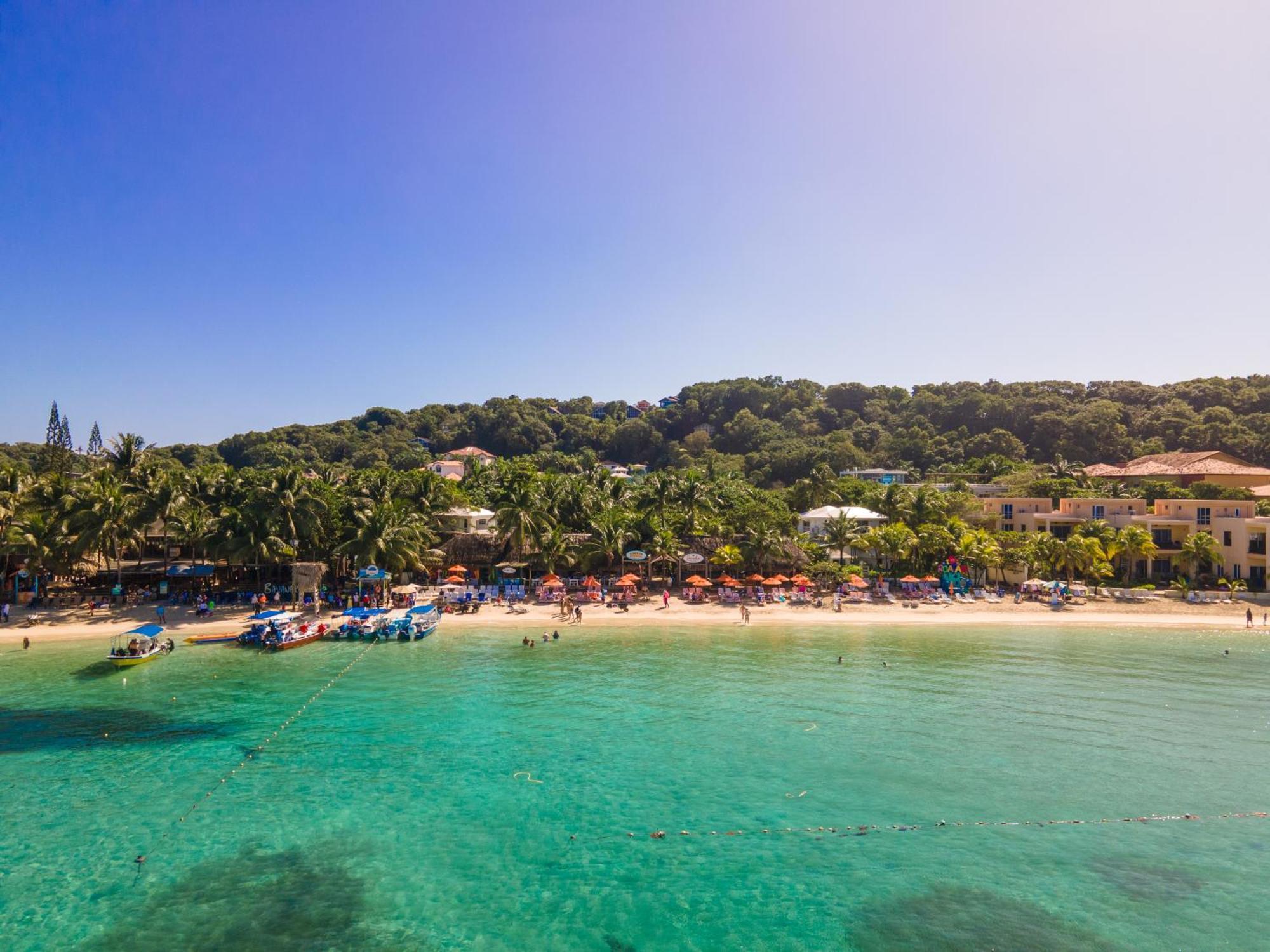 Paradise Beach Hotel & Resort West Bay Buitenkant foto