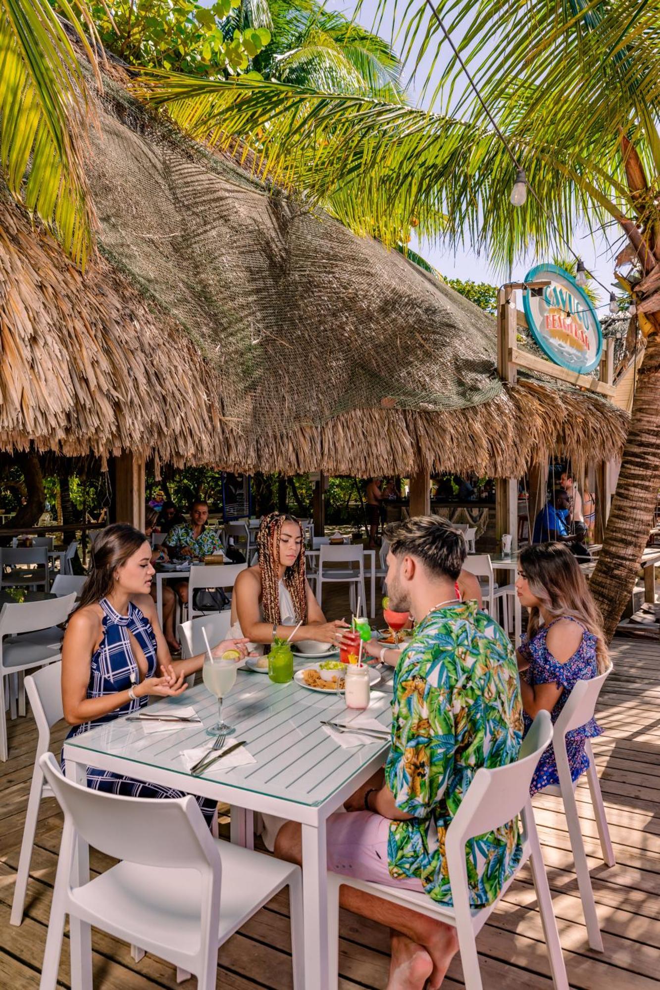 Paradise Beach Hotel & Resort West Bay Buitenkant foto